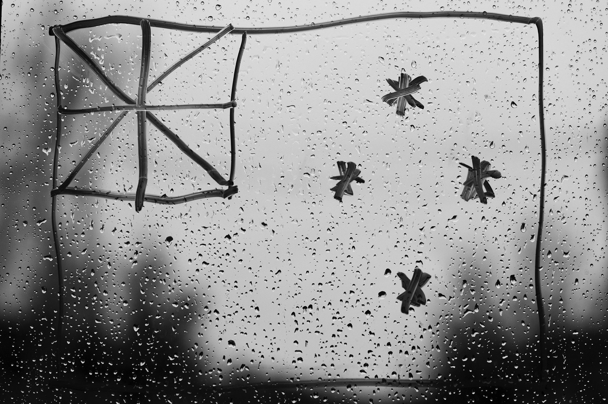 Make a flag, I created a NZ flag with a whiteboard marker on the rainy window of my office in Black and White