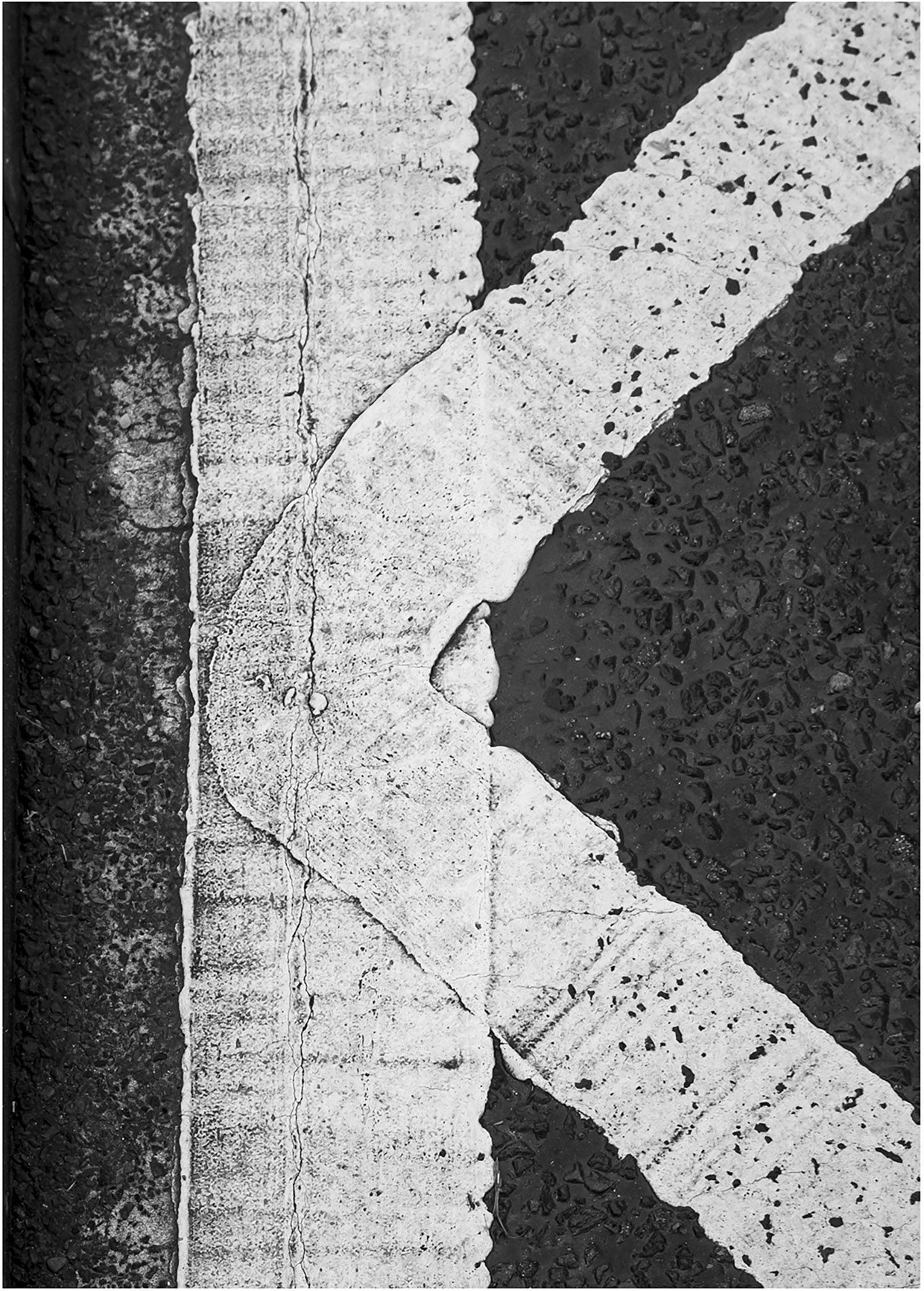 Black and white photo in the shape of letter K