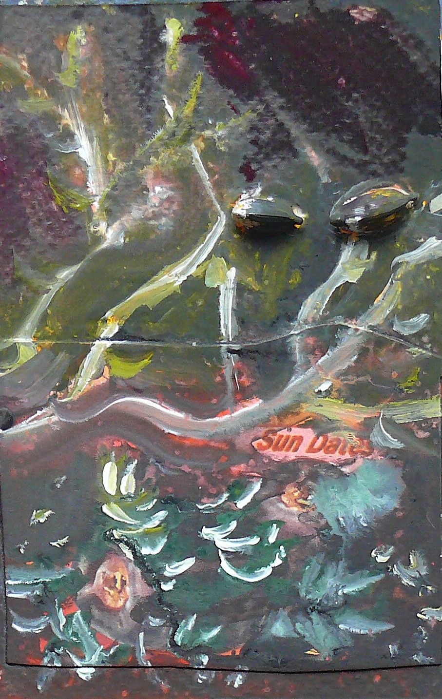 plant branches painted over a piece of packaging from a date box