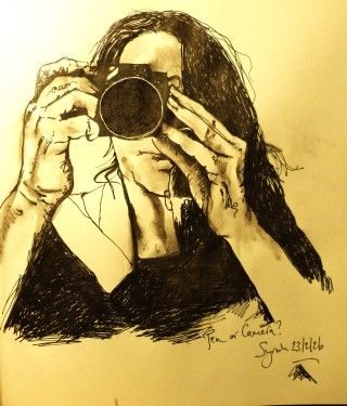 black pen drawing of female artist with SLR camera held up to her face.