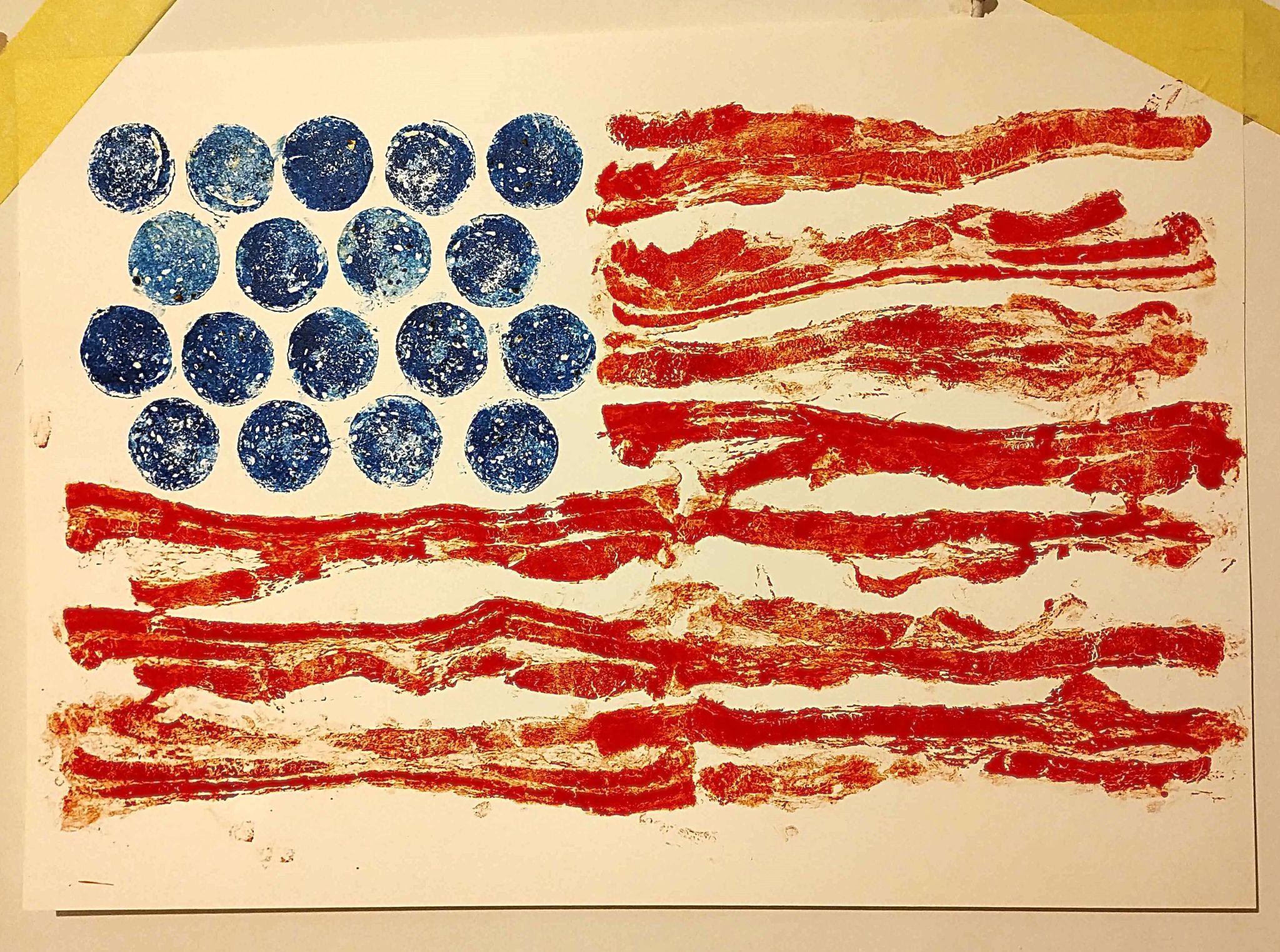 'Porky Pies' is a depiction of the American Flag, printed using streaky bacon and salami