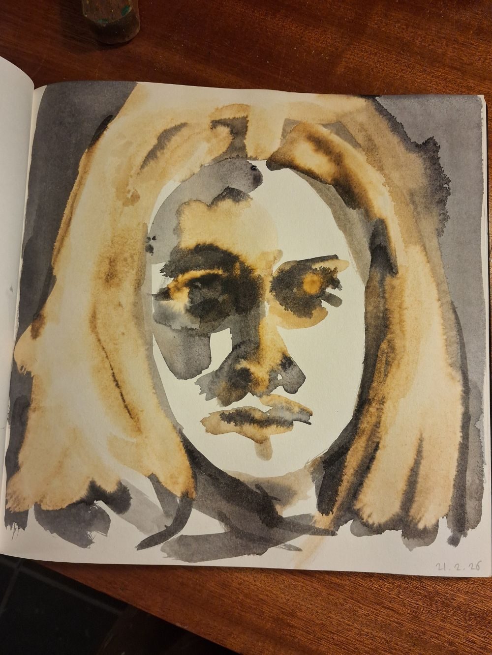 Self portrait in black ink with bleach on paper