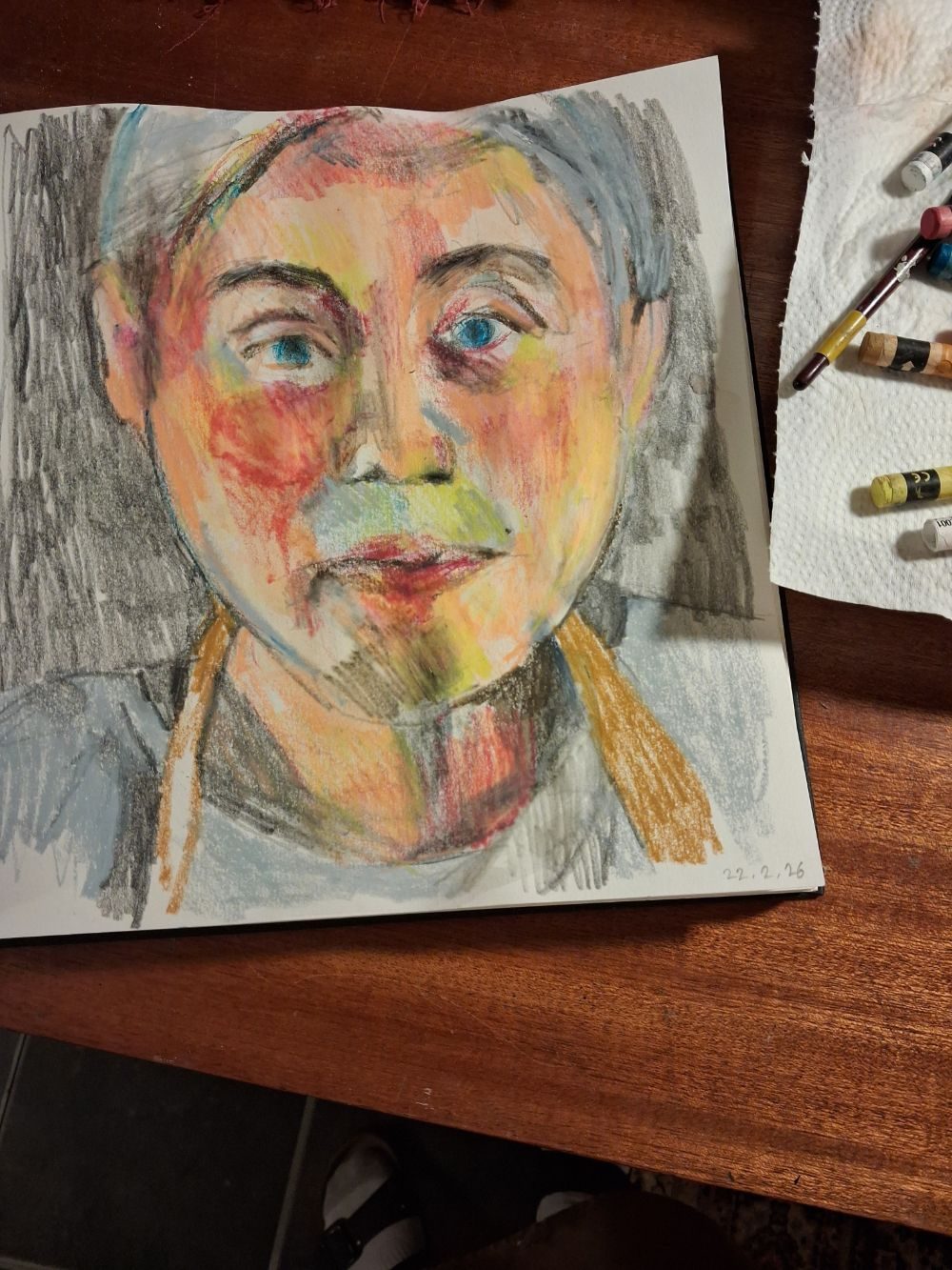 Self portrait in water soluble crayons on paper