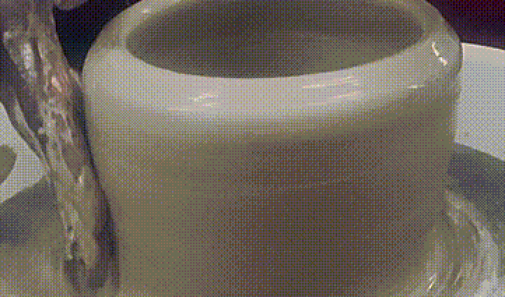 a cylinder of clay with a hole abit of centre