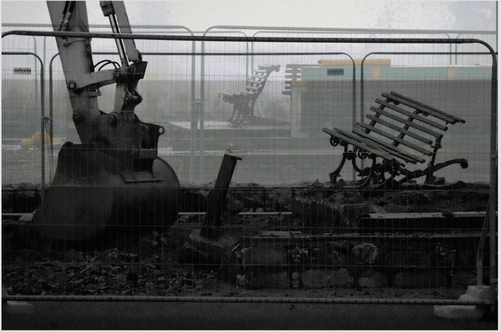 Two superimposed images of a sea side bench in different degrees of dilapidation