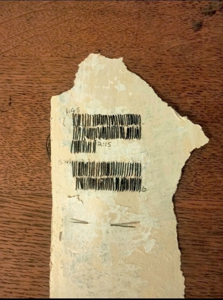 Stitches on torn off wallpaper, was thinking about time and making time.