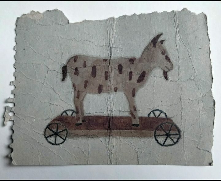 Oil painting of an antique goat toy, found card