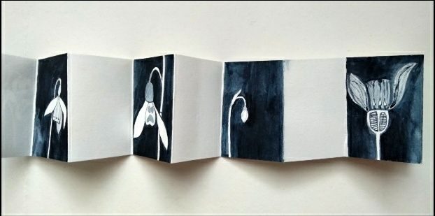Small painting of a snowdrop, in concertina book - held inside gifted matchbox.