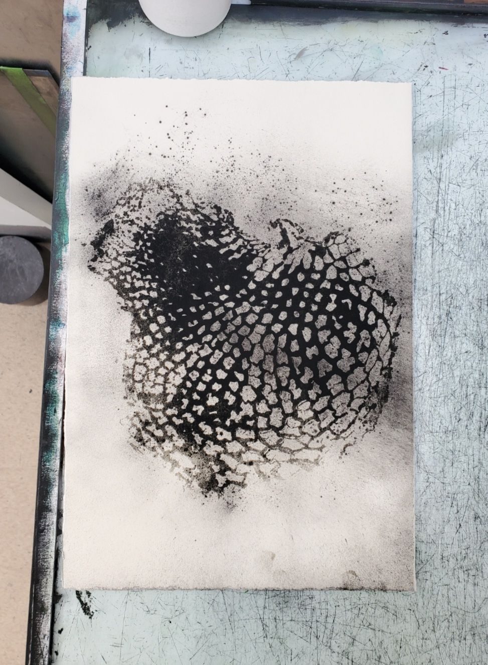 A print made from a latex tripe done with oil and pigment