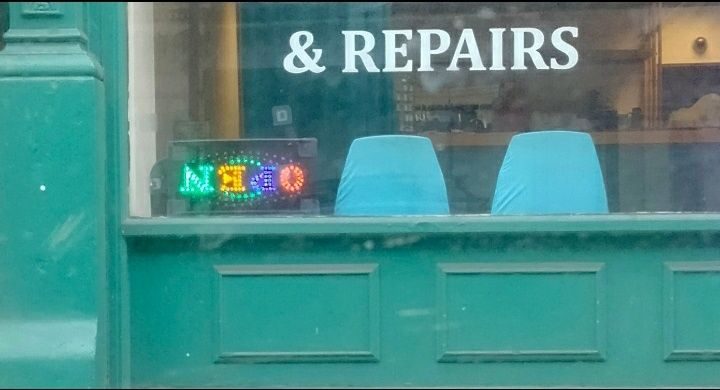 Shop sign fitted the wrong way up.