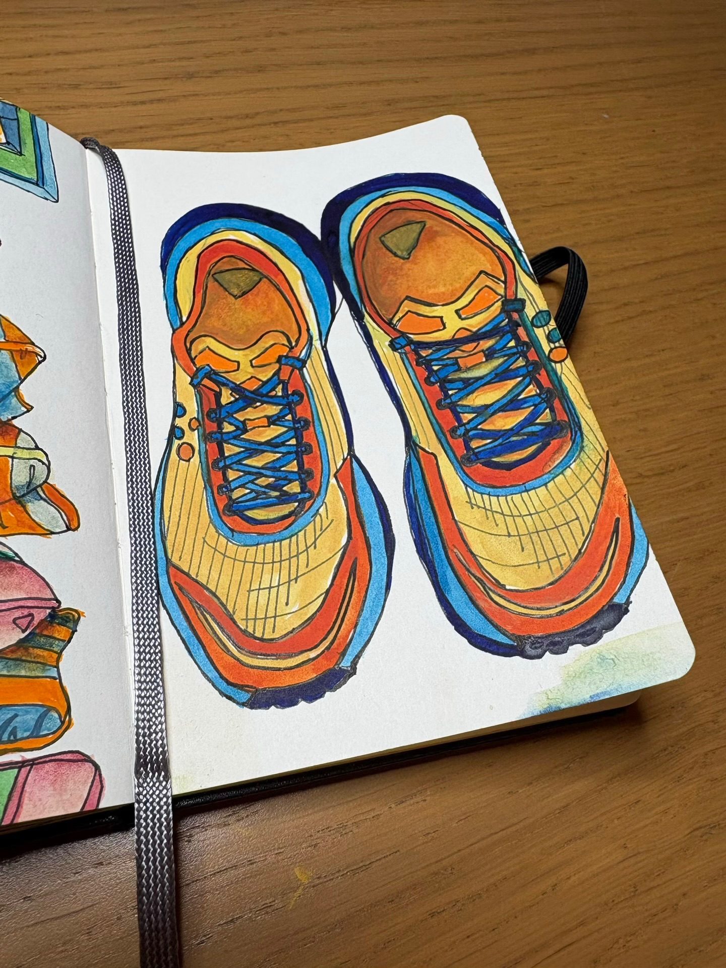 Watercolour painting of a pair of trainers