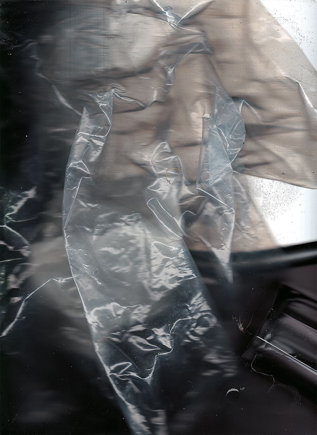 Photographic composition built out of transparent materials on black background.