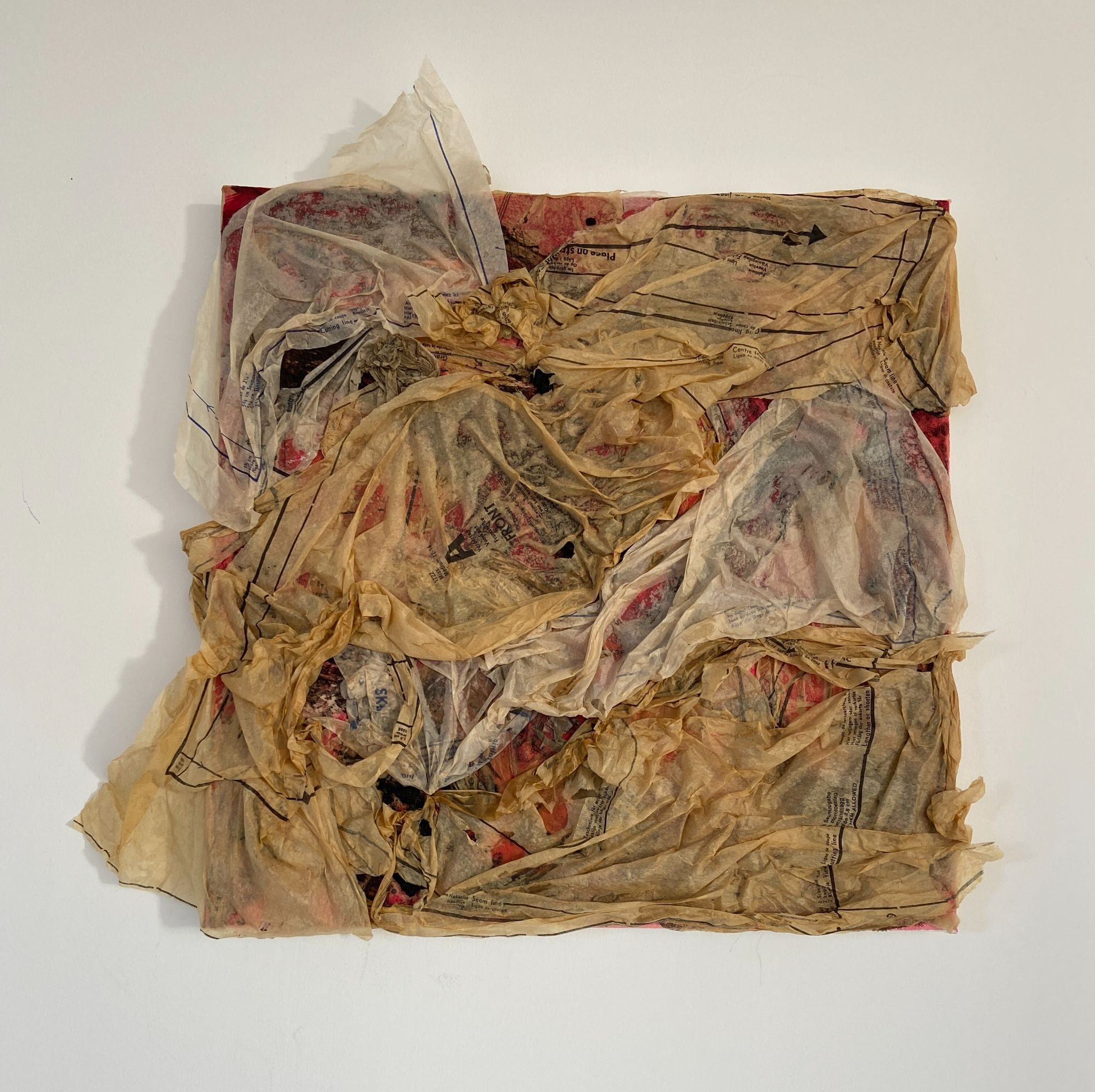 WIP revisiting previous piece, experimenting with a red background and textured sewing patterns on top layer.