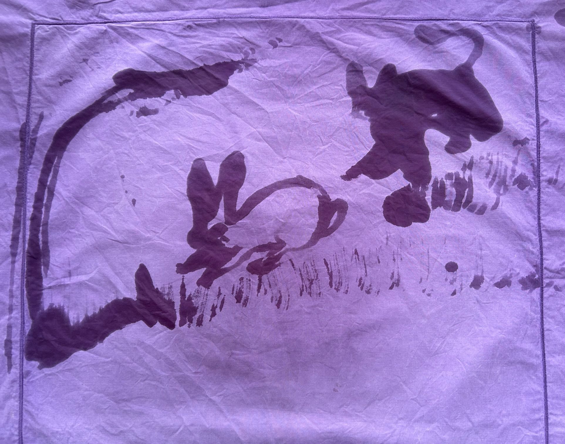 Cat chasing Rabbit - Painted with water on a pillow case - dries out and disappears