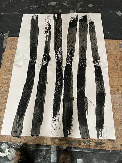 A drawing made from six black stripes on white paper