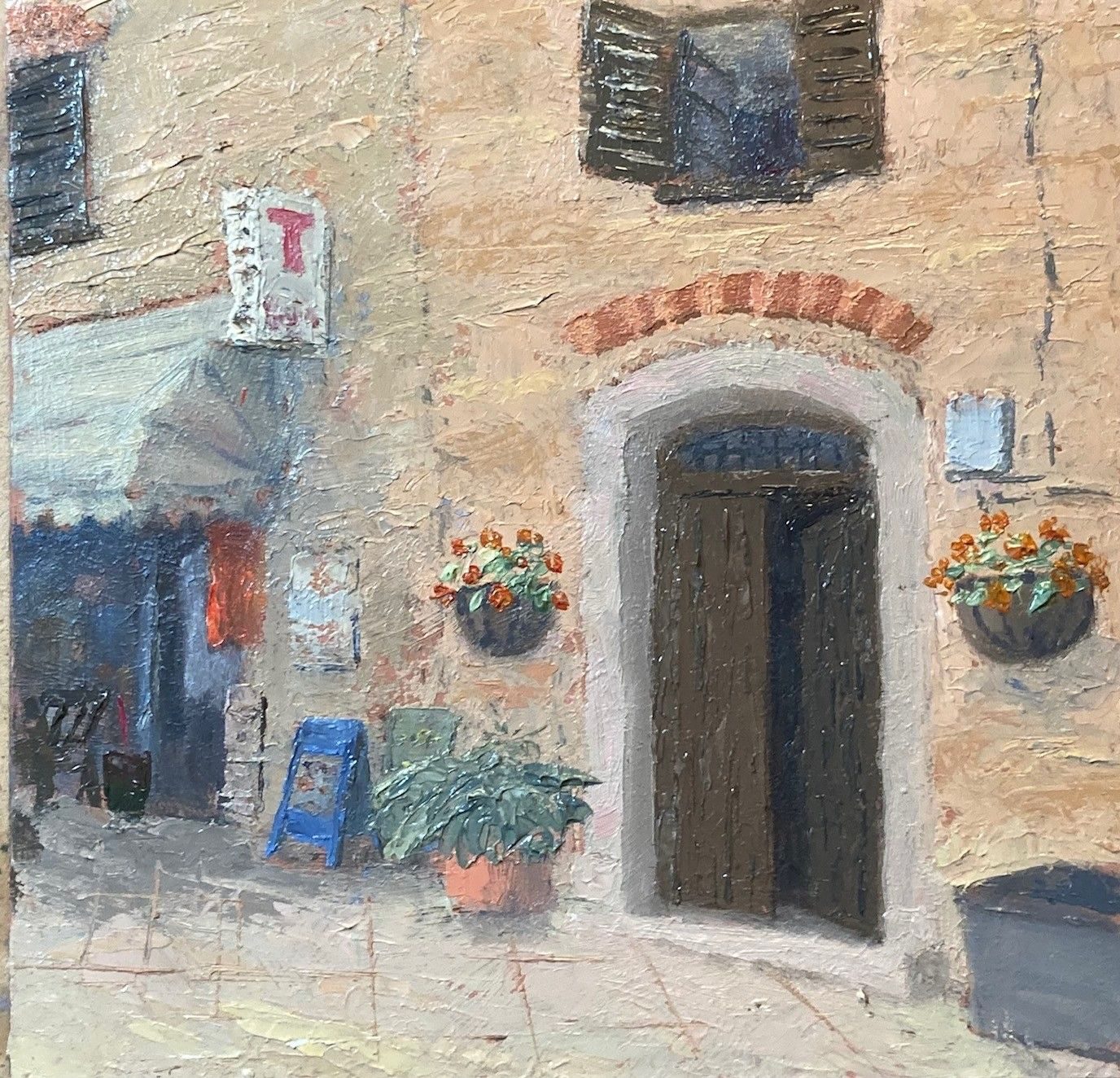 Oil painting on board, 20cm x 20cm. A doorway in the Pizza Umberto 1, Panicale, Umbria