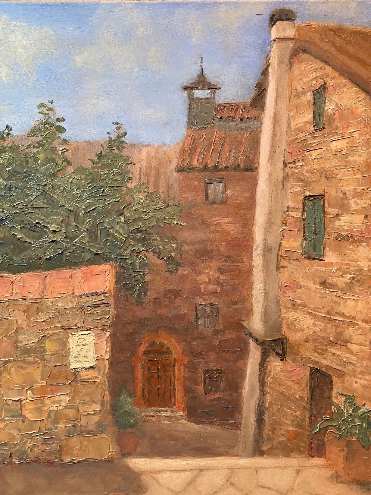 Oil paint on board, 20cm x 26.5cm. A view of Via Corsetti from Piazza del Podesta, Panicale, Umbria.ry woodland and a hills visible in the background.
