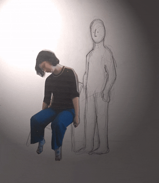 a short animation of a drawing using a person like a ventriloquist's dummy