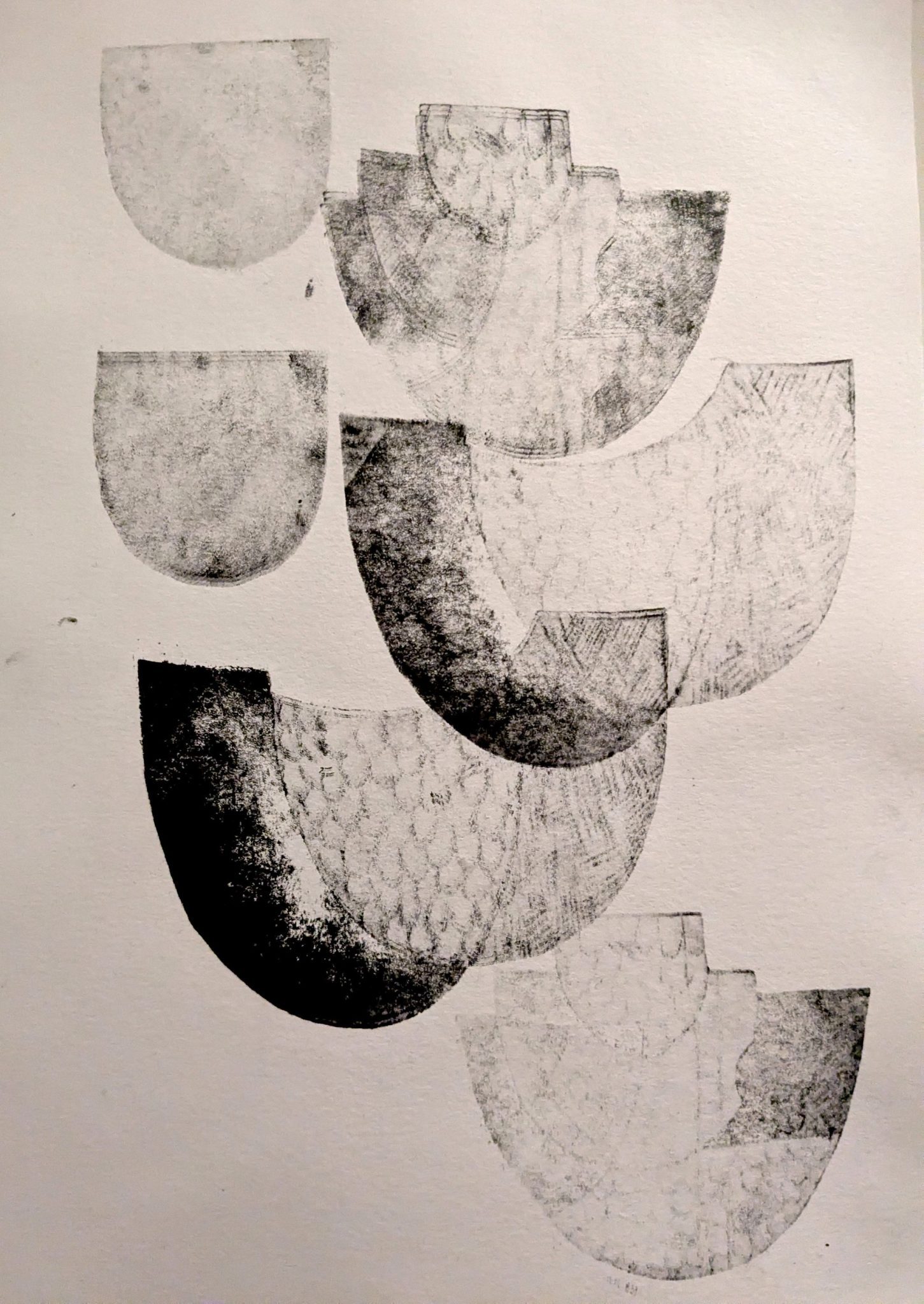 Black curved shapes on a white background