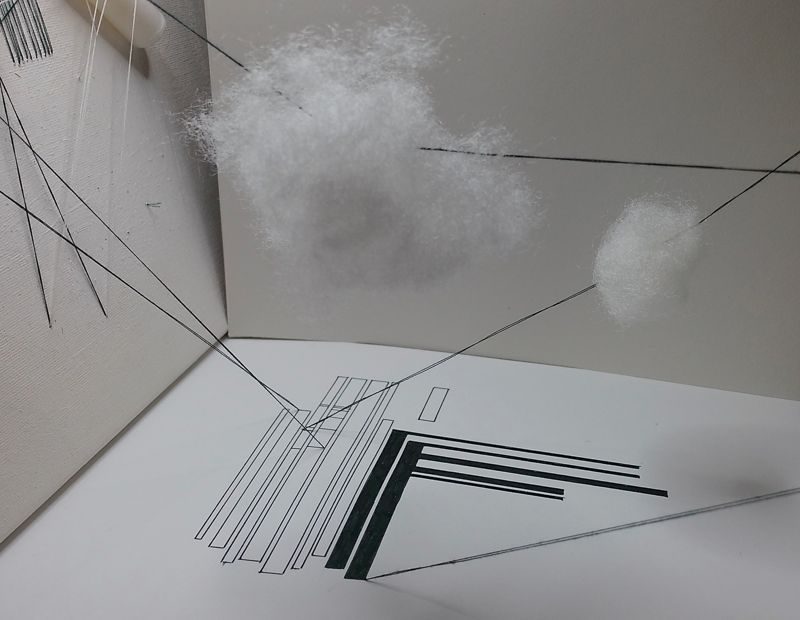 two clouds of fluff suspended over geometric drawing in black pen, mixed media