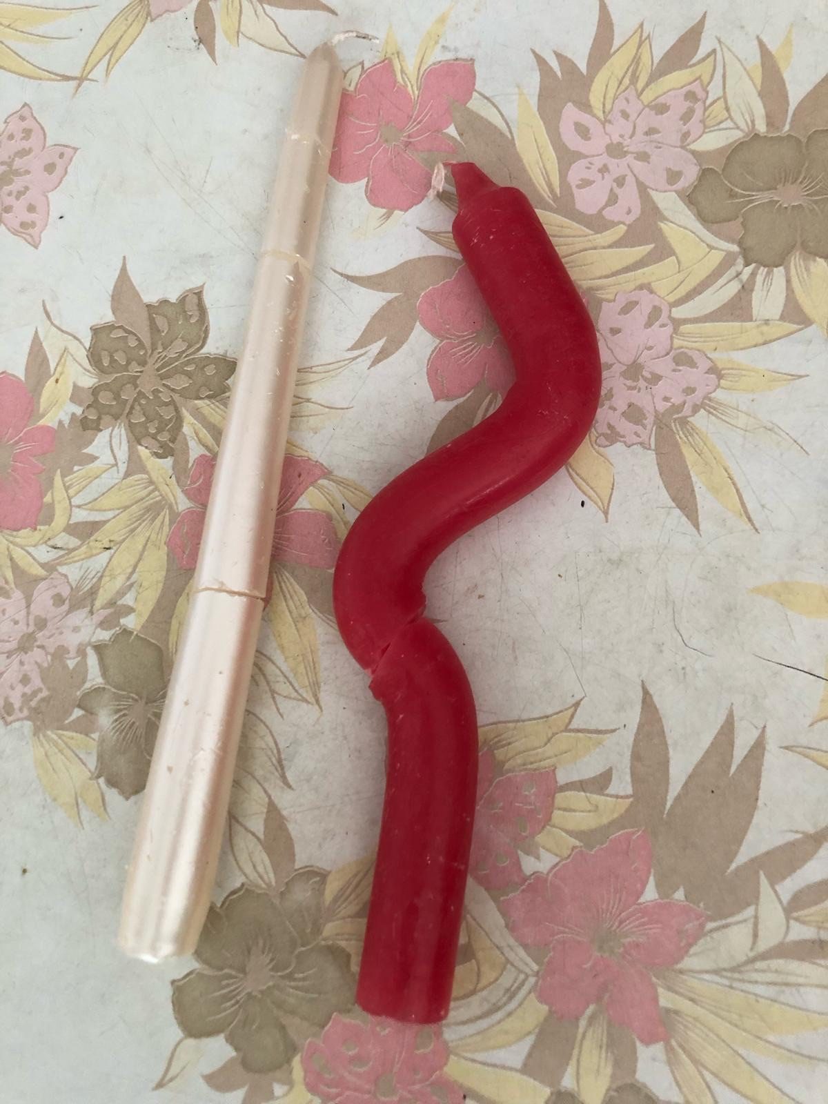 candles I found on the street which were hobby candles bent to a point where it couldn’t be used. I snapped them and rearranged them to suggest it could be used, no end;)