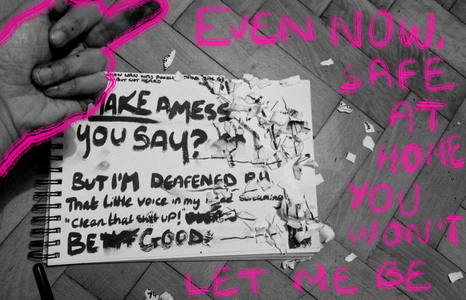 Black and white photo of a sketch book with 