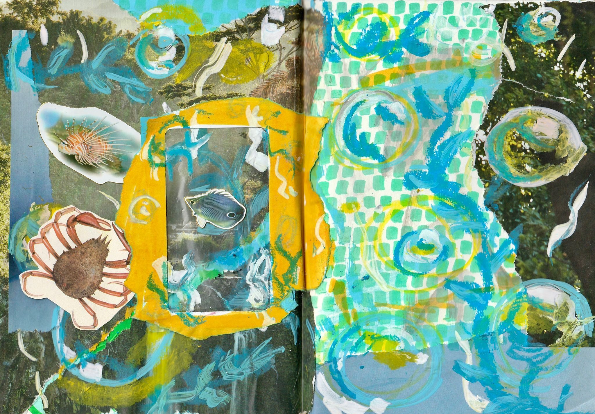 A collage across two pages of a sketchbook, with various bubbles messily doodled over a collaged picture of a waterfall and various patterns. there is also fish stickers around and a big crab illustration cut from a book