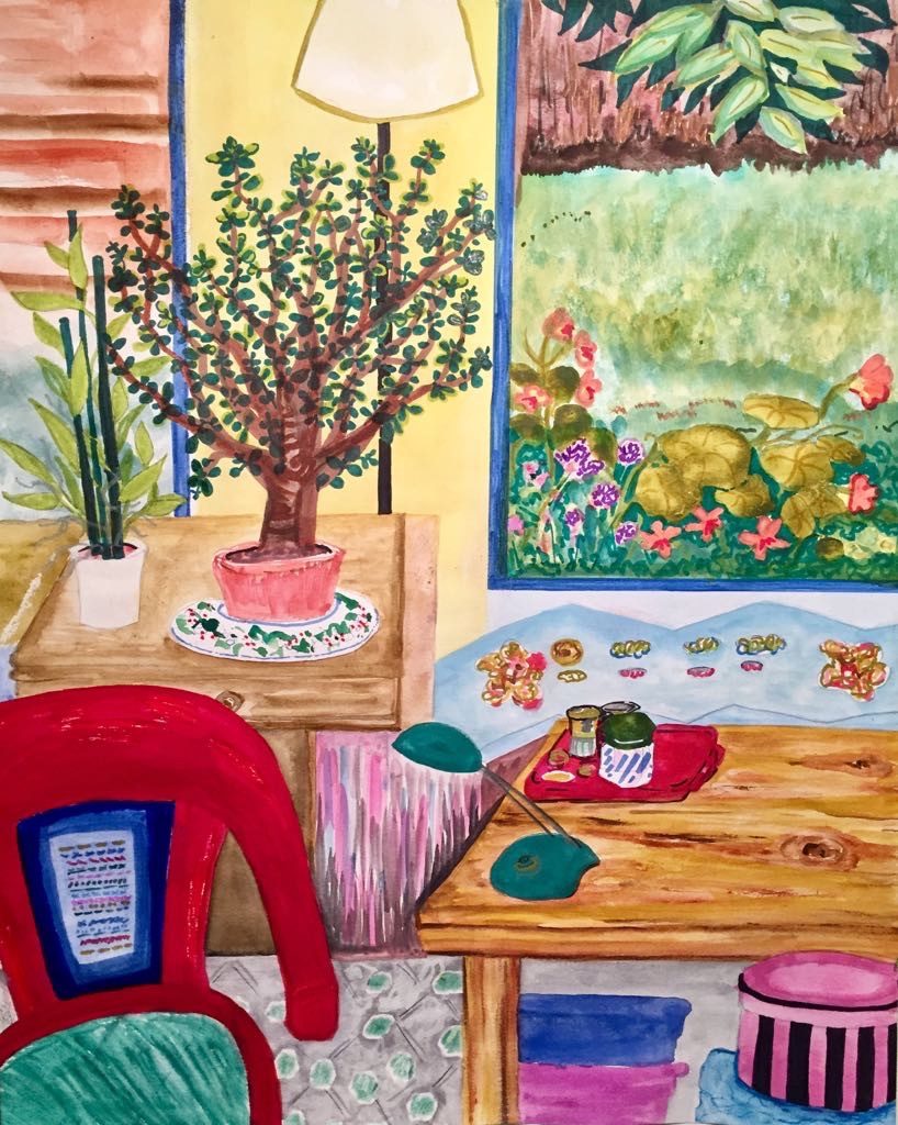 Colourful interior with red chair, table, plants and garden views…childhood home art station