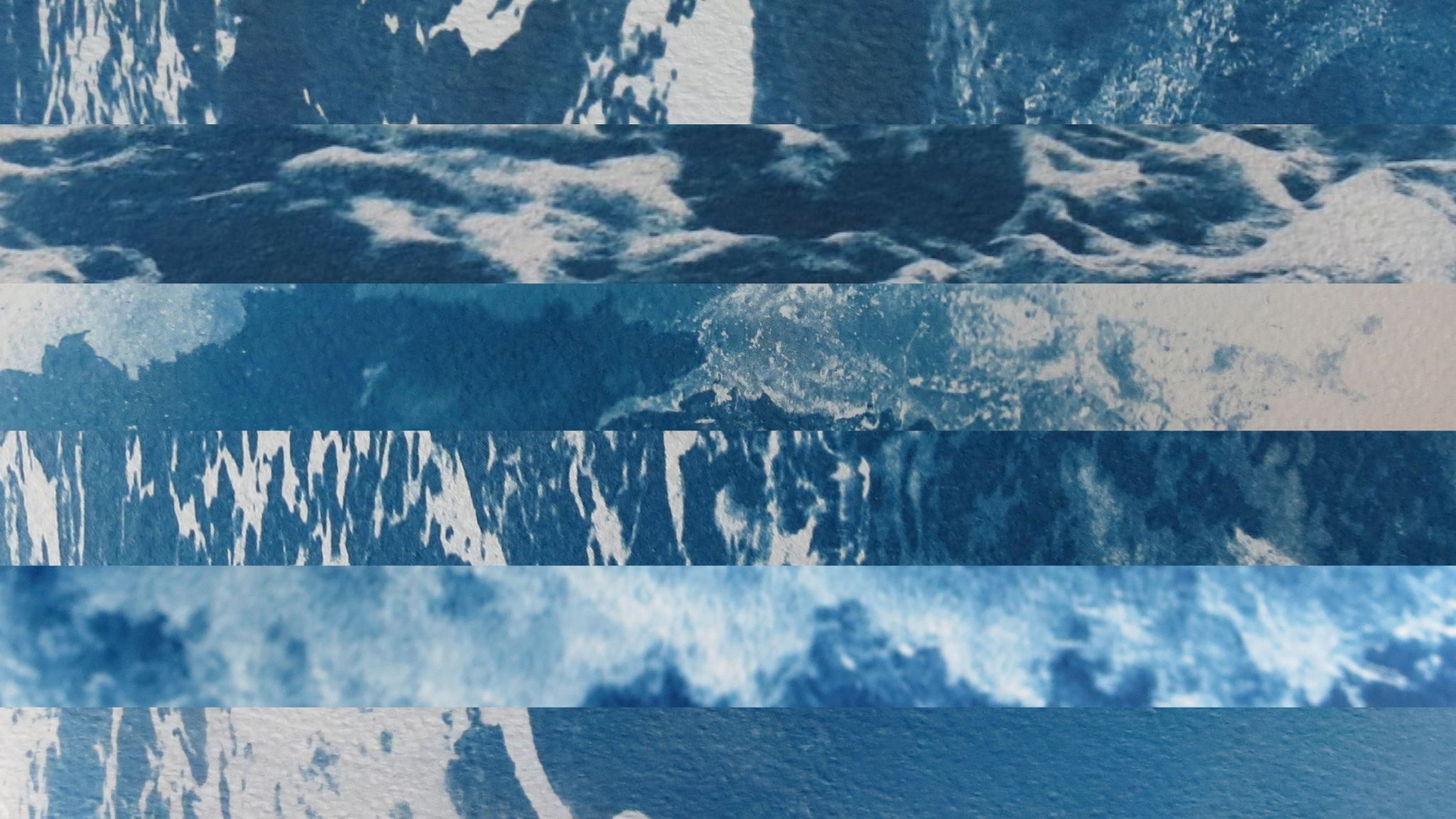 ‘fluid flag’ is composed of 6 diverse cyanotype images of photographs of past seas I have experienced that were part of my 2013 multi-media installation work “See, Sea”.  I sliced them horizontally, layering them into linear strips composing the flag. The patterning of the varied sea currents allow the ‘lines’ a folding, disrupting and softening the more geometrical designs which are attributed to a flag.
