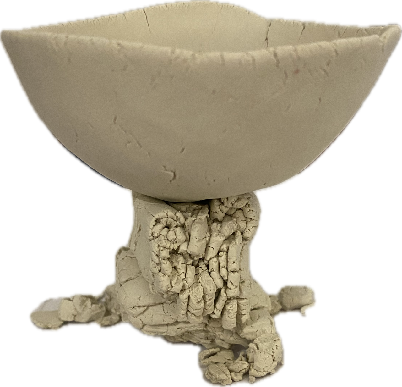 Porcelain pinch pot stacked on porcelain fragments