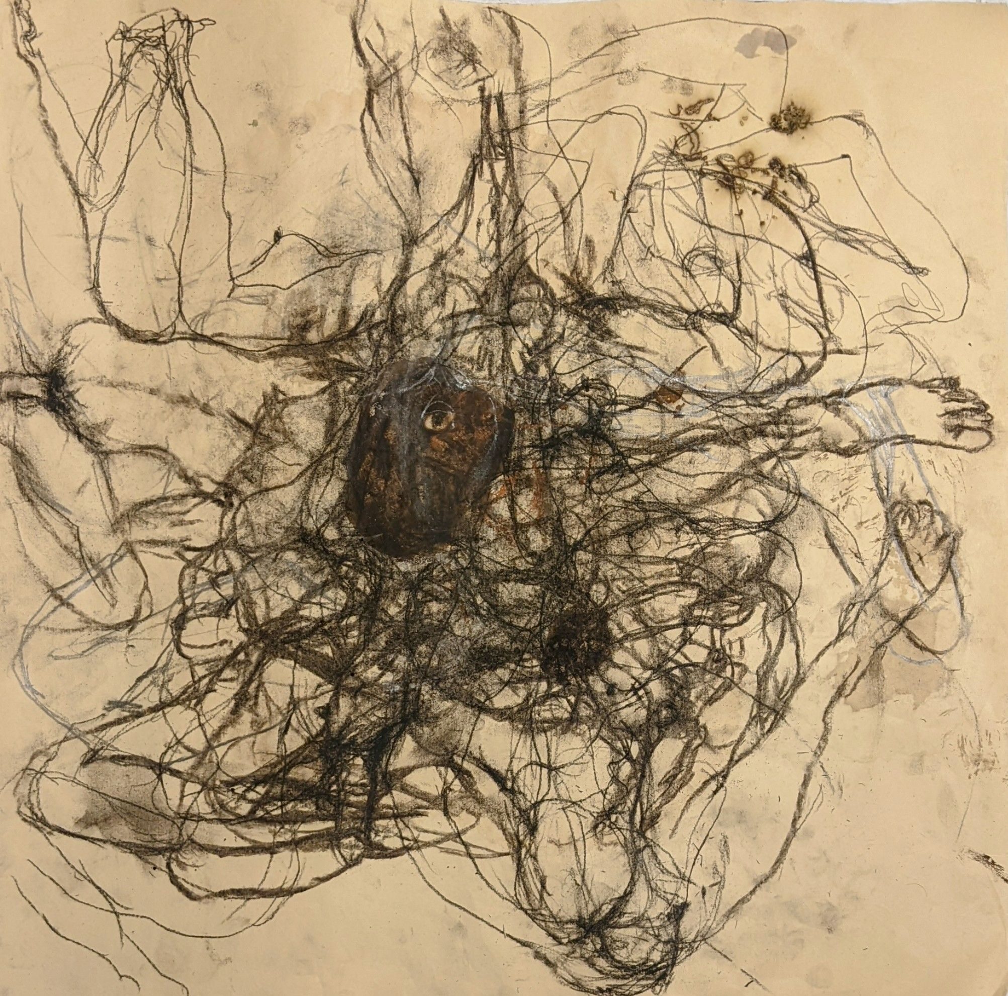 Repeated motif of two entangled bodies in charcoal and squid ink on paper