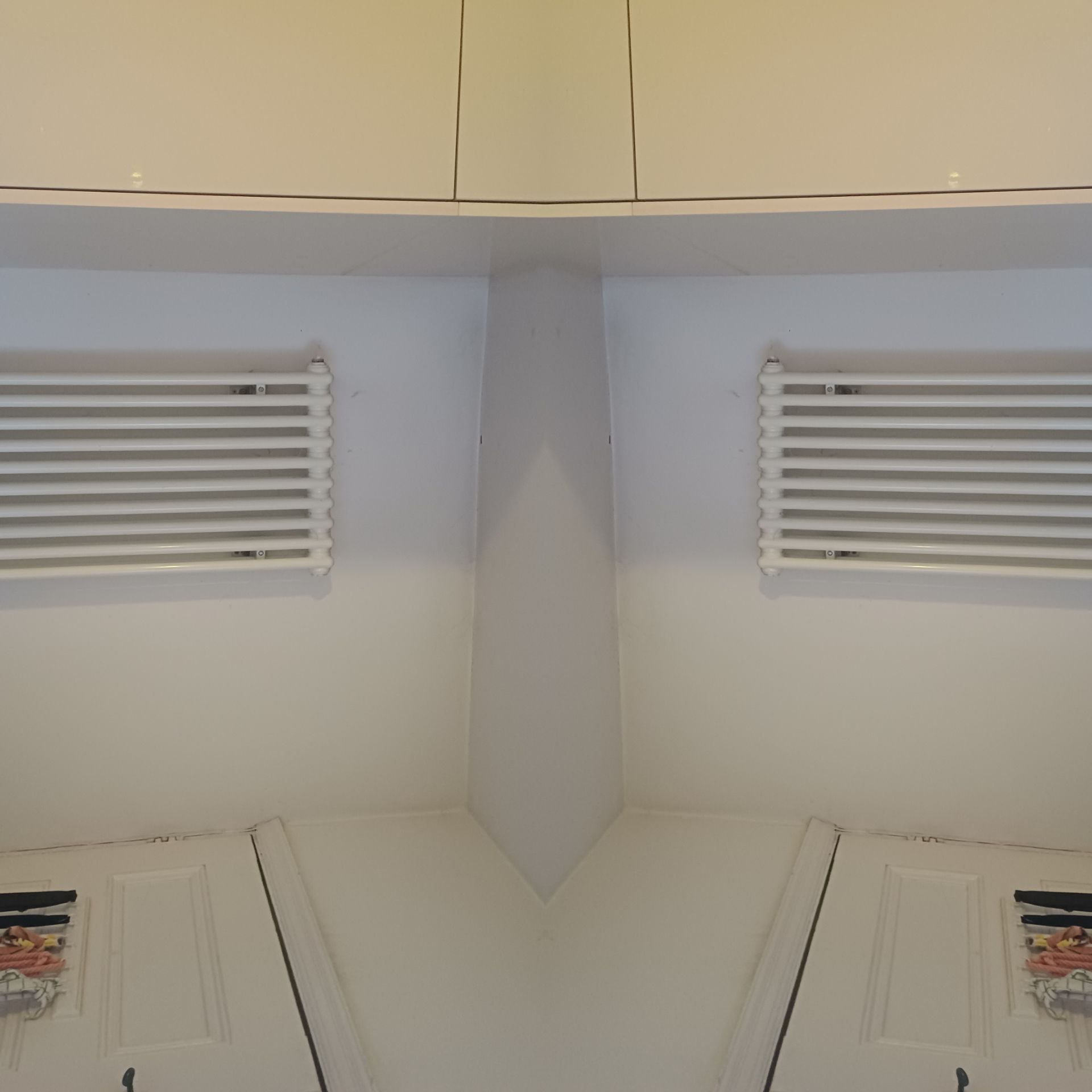 DIGITAL IMAGE OF BLAND PART OF MY KITCHEN LOOKING A LITTLE LIKE A ROBOTIC FACE