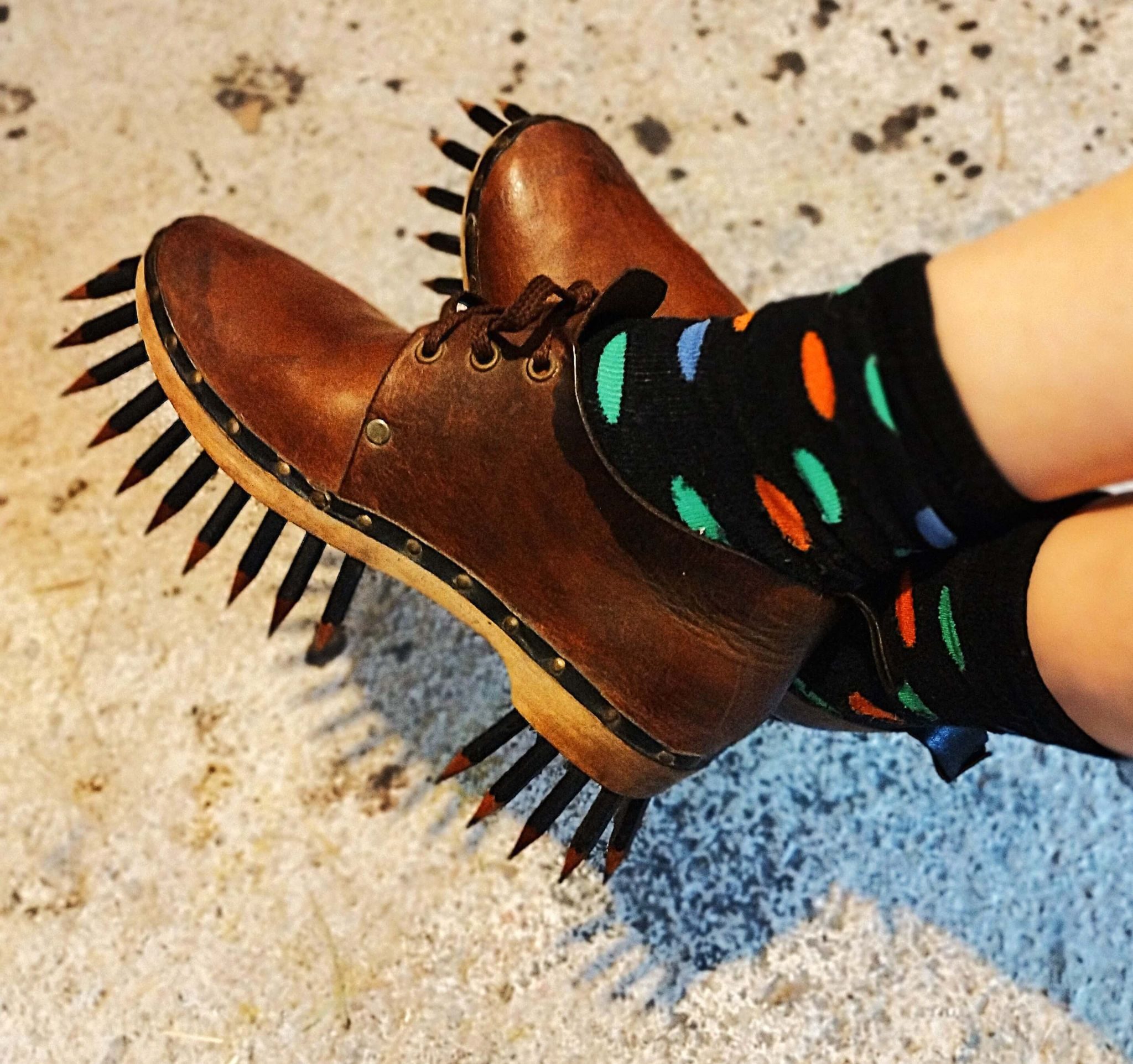 2B or not 2B is a photograph of my feet, sitting on the stool in my studio. I am wearing a pair of Morris Dancing Clogs, which have had short pencils inserted into to the wooden soles.