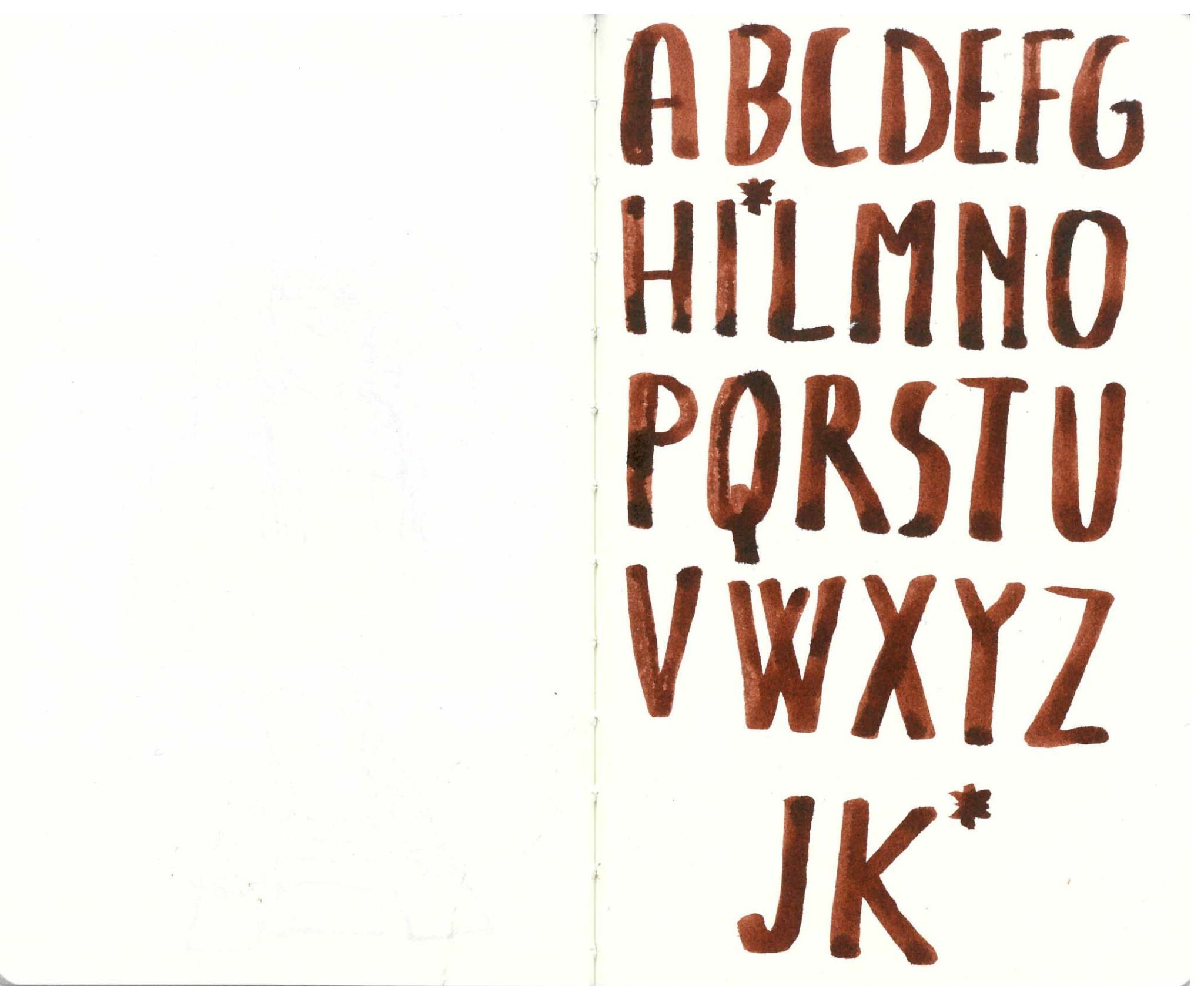 Alphabet. Brown watercolors on paper.