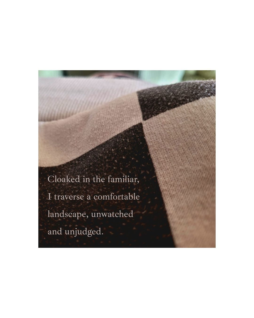 a photo of an old checked bobbly pair of trousers on the sofa