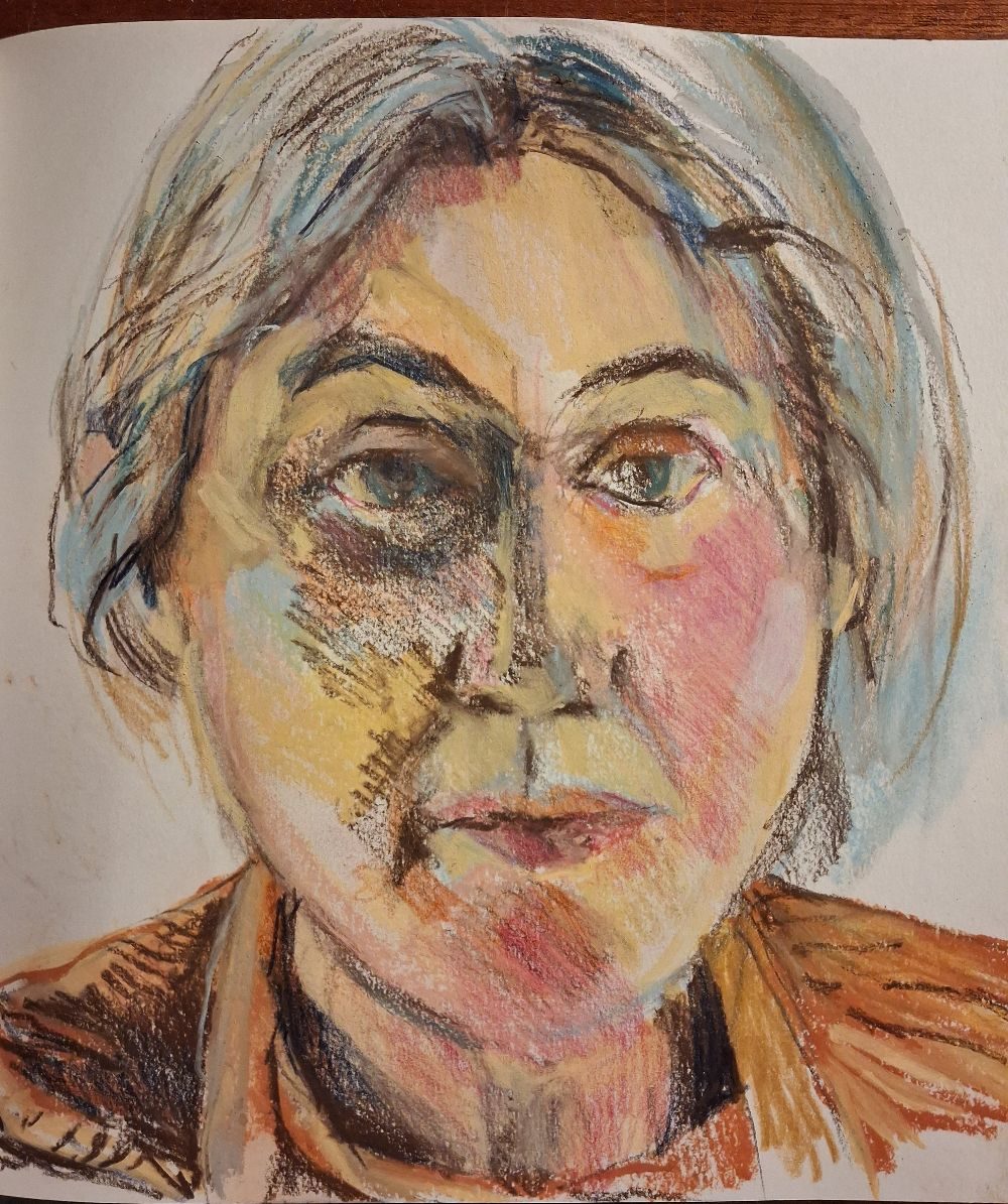 Self portrait in pencil crayon and chalk pastel on paper