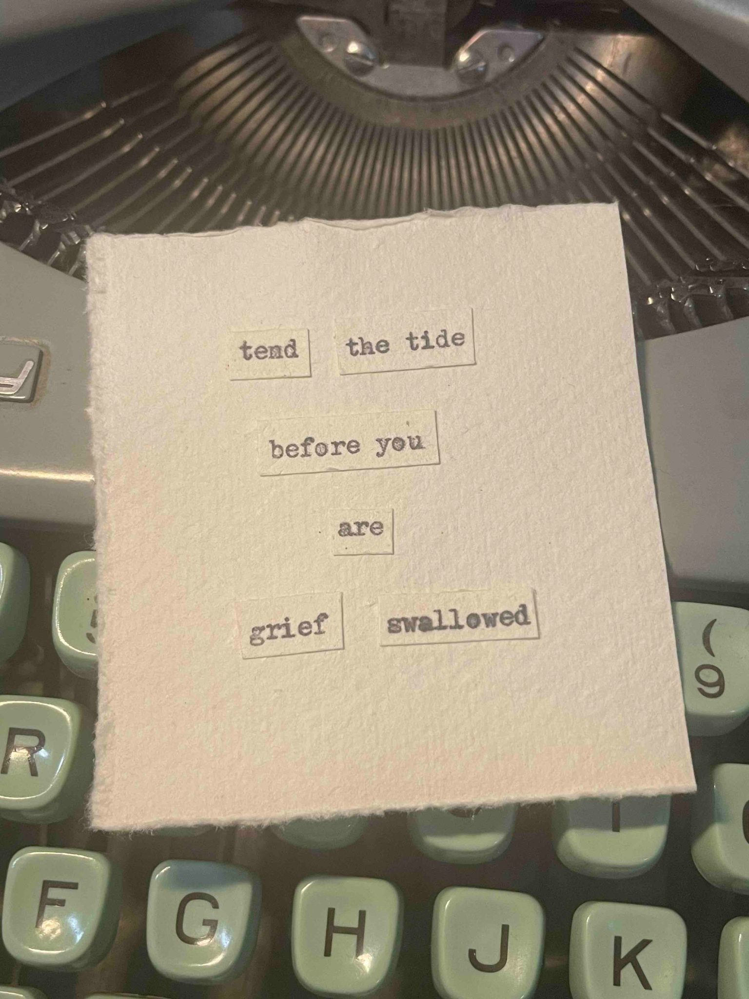 a typewritten poem made of random words i picked out of my cut up word basket