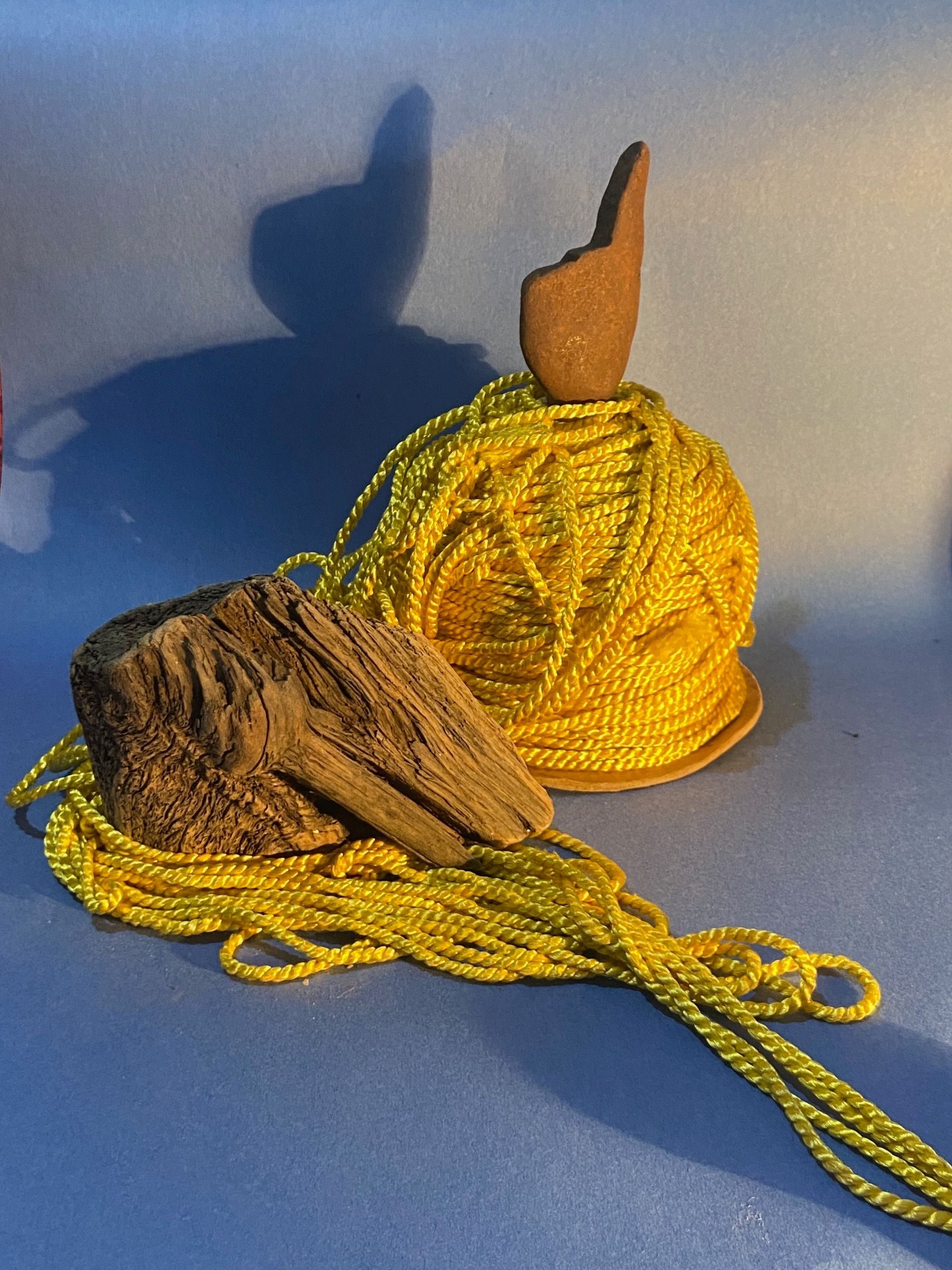 the golden chord mountain, which now has a stone hand pointing to the sky, has transformed part of itself to a river, running around a wooden rock and going somewhere else