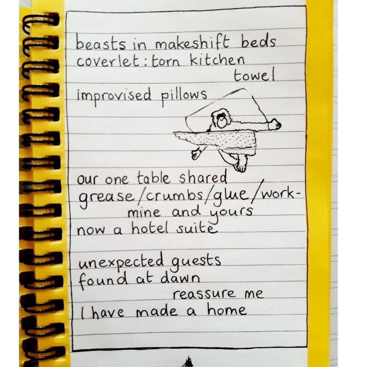 Photograph of a journal or sketchbook page with writing and drawing